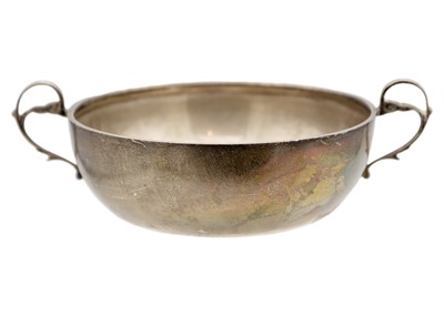 Lot 116 - A silver twin-handled porringer.