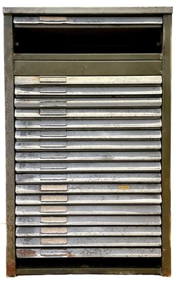 Lot 112 - An 18 drawer painted steel printer's block cabinet, with some type.