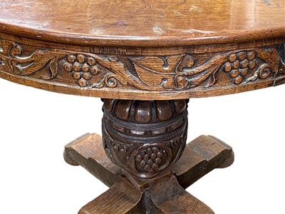 Lot 856 - Frank Rosier, A carved oak circular centre table, in the 17th century taste.