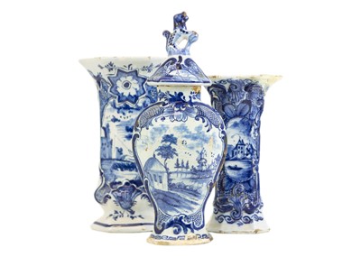 Lot 461 - A Dutch Delft blue and white vase and cover.