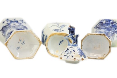 Lot 461 - A Dutch Delft blue and white vase and cover.