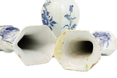 Lot 461 - A Dutch Delft blue and white vase and cover.