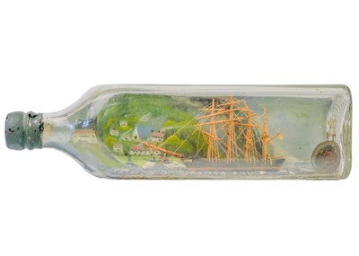 Lot 6 - Model ship in a bottle, 1944