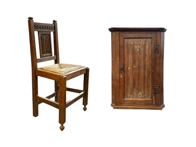 Lot 860a - Frank Rosier, A small linen fold oak corner cupboard, and a side chair.