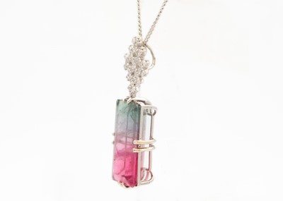 Lot 22 - A rare bi-colour tourmaline and diamond pendant, set in 18ct white gold.