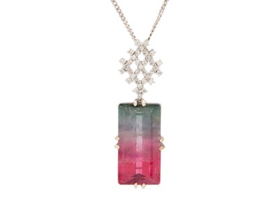 Lot 22 - A rare bi-colour tourmaline and diamond pendant, set in 18ct white gold.