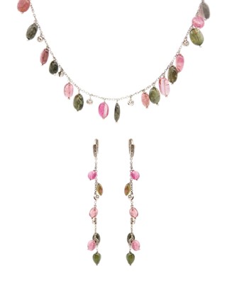 Lot 23 - An 18ct white gold tourmaline and cubic zirconia set fringe necklace and earring set.