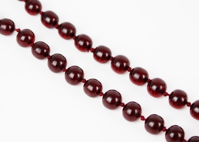 Lot 256 - A bakelite 'cherry amber' bead necklace.