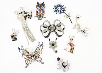 Lot 239 - Butler & Wilson - A selection of nine brooches.