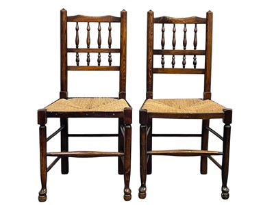 Lot 634 - A group of 10 matched Lancashire spindle back ash chairs.