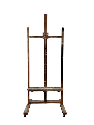 Lot 690 - An oak adjustable artist's easel.