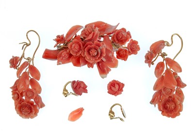 Lot 62 - A Victorian floral carved coral brooch and earring suite.