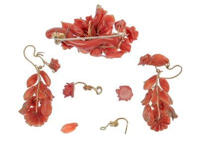 Lot 62 - A Victorian floral carved coral brooch and earring suite.