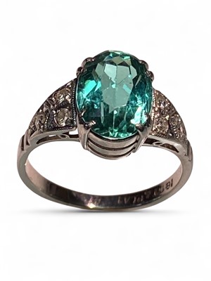 Lot 45 - A rare paraiba tourmaline of 2.15ct, set in a diamond set Art Deco 18ct white gold and platinum ring.