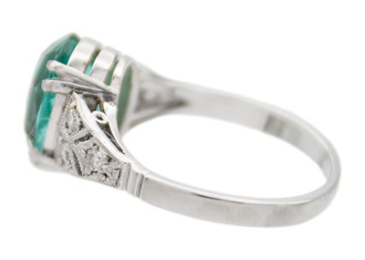 Lot 181 - A rare paraiba tourmaline of 2.15ct, in a diamond set Art Deco 18k white gold and platinum ring.