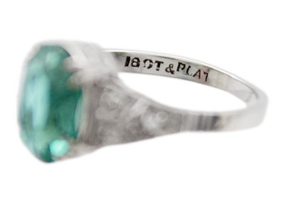 Lot 181 - A rare paraiba tourmaline of 2.15ct, in a diamond set Art Deco 18k white gold and platinum ring.