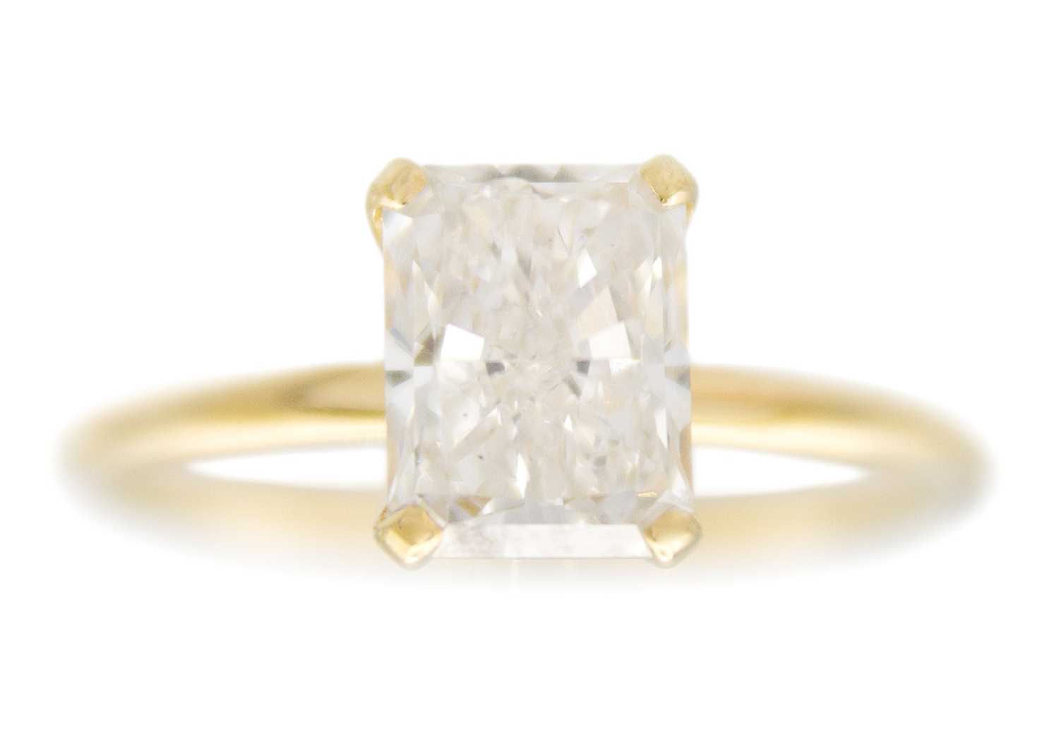 Lot 173 - A laboratory-grown 1.30ct (estimated) radiant-cut diamond ring, 18k mounted.