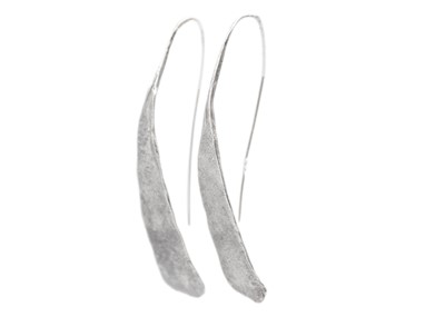 Lot 38 - EMILY NIXON - A pair of large silver earrings with gold hook fittings.