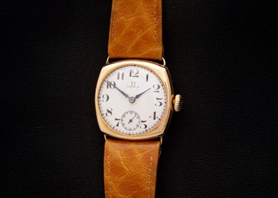 Lot 143 - OMEGA - A 14ct cushion cased manual wind gentleman's wristwatch.