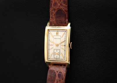 Lot 81 - HAMILTON - A 14ct tank-cased gentleman's manual wind wristwatch.