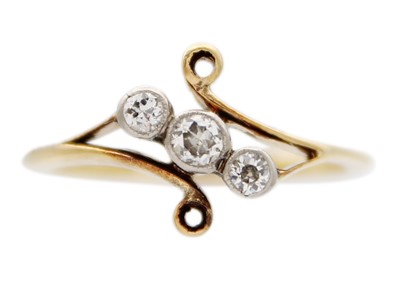 Lot 66 - An 18ct diamond set three-stone ring.