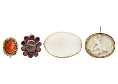 Lot 70 - Four 19th-century, gold-mounted, brooches.