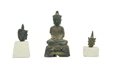 Lot 1075 - A bronze Thai seated Buddha probably 18th century.