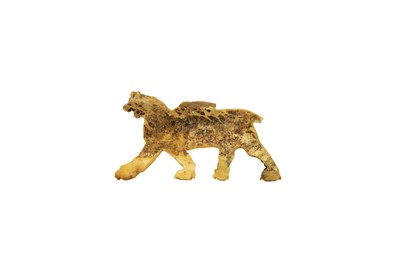 Lot 1062 - A Phoenician bone plaque of a winged lion.