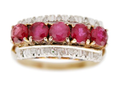 Lot 81 - A 14ct ruby and diamond set ring.