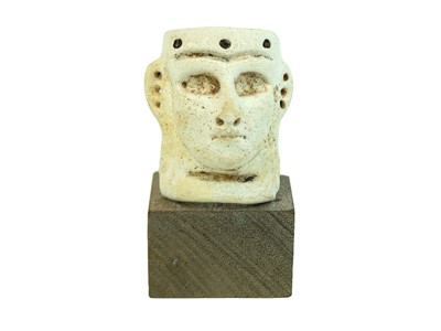 Lot A middle Assyrian faience frit mask.