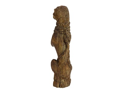 Lot 1130 - An oak 'Kings Beast' carved figure.