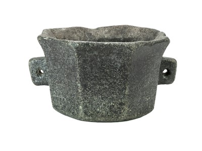 Lot 1127 - A German octagonal serpentine mortar.