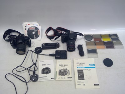 Lot 25 - Two Canon Digital Cameras and a selection of...