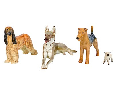 Lot 483 - A Beswick Afghan hound and an Airedale terrier.