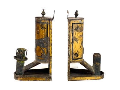 Lot 119 - A pair of toleware Argand lamps.