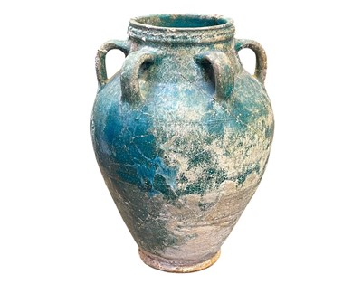 Lot 1107 - A Parthian turquoise glazed pottery amphora.