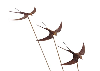 Lot 601 - Three wrought iron swallow garden ornaments.