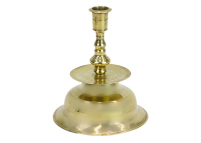 Lot 1119 - A German brass candlestick.