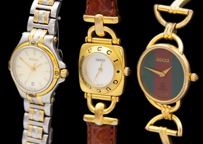 Lot 194 - GUCCI - Three lady's quartz wristwatches within boxes.