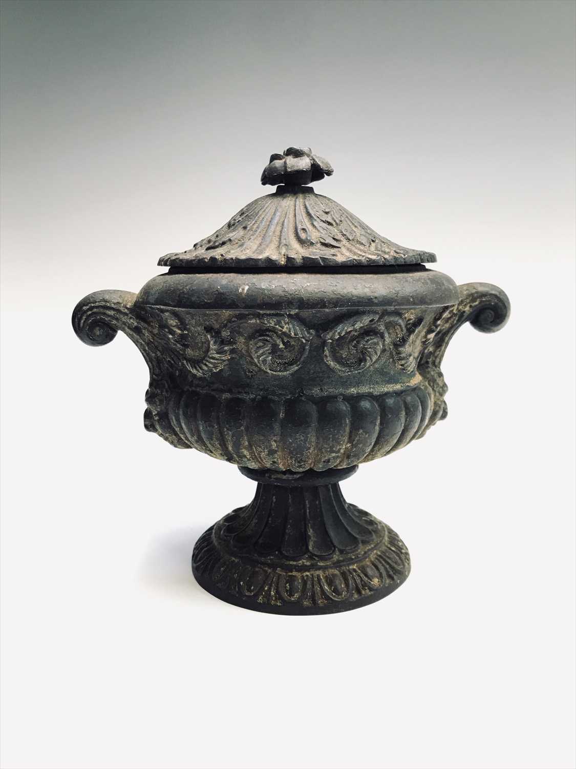 Lot 6 - An early 20th century cast iron lidded...