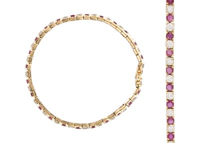 Lot 93 - 14k gold ruby, white spinel tennis bracelet