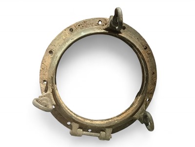 Lot 990 - A large brass porthole