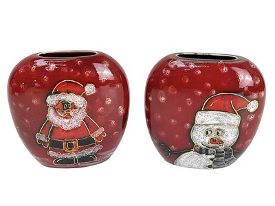 Lot 331 - An Anita Harris Art Pottery trial Christmas purse vase.