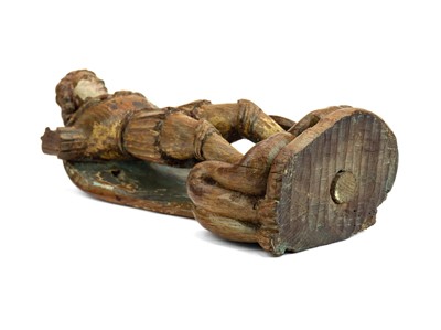 Lot 1103 - A carved oak figure of St Michael vanquishing Satan.
