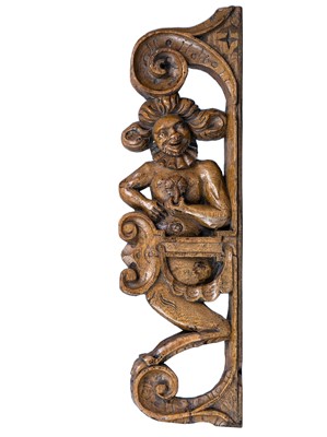 Lot 1002 - An Elizabethan oak grotesque carving of a satyr.