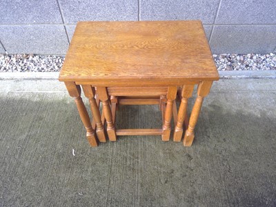 Lot 38 - A Nest of Oak Tables. The Large Table measures...