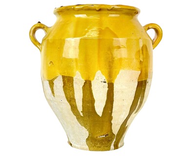 Lot 1042 - A French provincial yellow glazed pot.