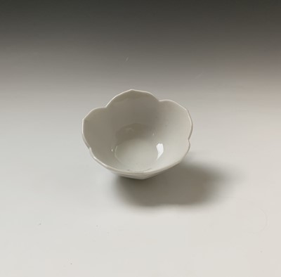 Lot 182 - A Chinese blanc de chine tea bowl, height 4cm,...