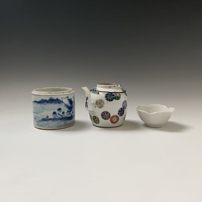 Lot 182 - A Chinese blanc de chine tea bowl, height 4cm,...
