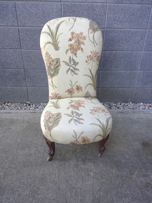 Lot 63 - A Victorian nursing chair, reupholstered with...